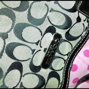 Black and gray coach purse